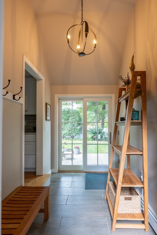 5 Crest Road Natick, MA 01760 - Photo 6 of 36 a view of an empty room with windows