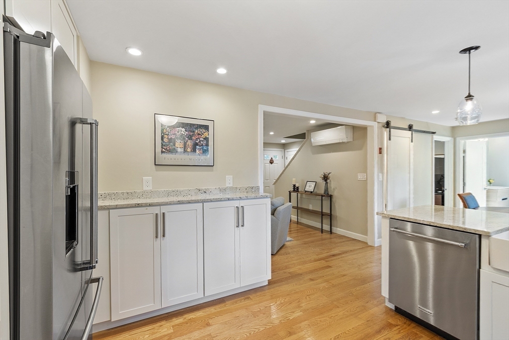 5 Crest Road Natick, MA 01760 - Photo 10 of 36 a view of cabinets with stainless steel appliances granite countertop a refrigerator and a sink