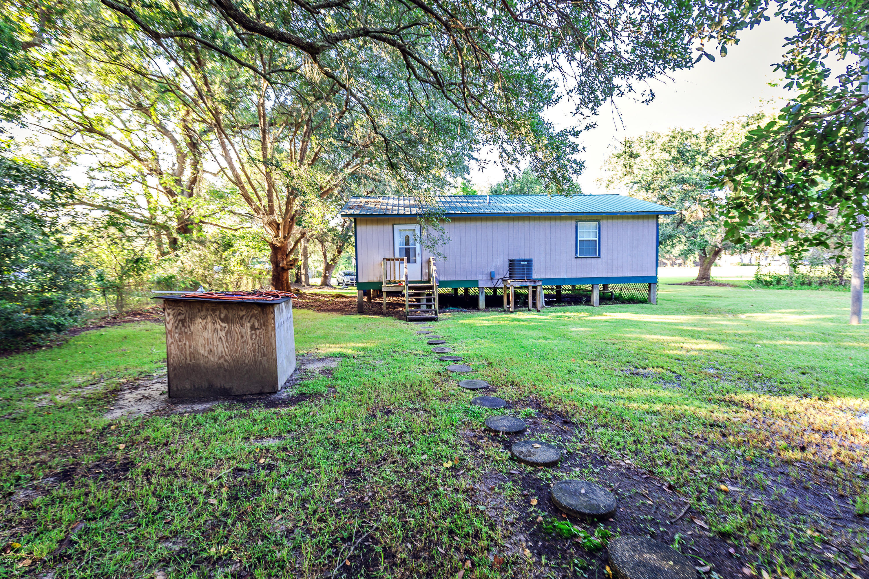8021 Pointe Aux Chenes Road Ocean Springs, MS 39564 - Photo 27 of 33 Back Exterior