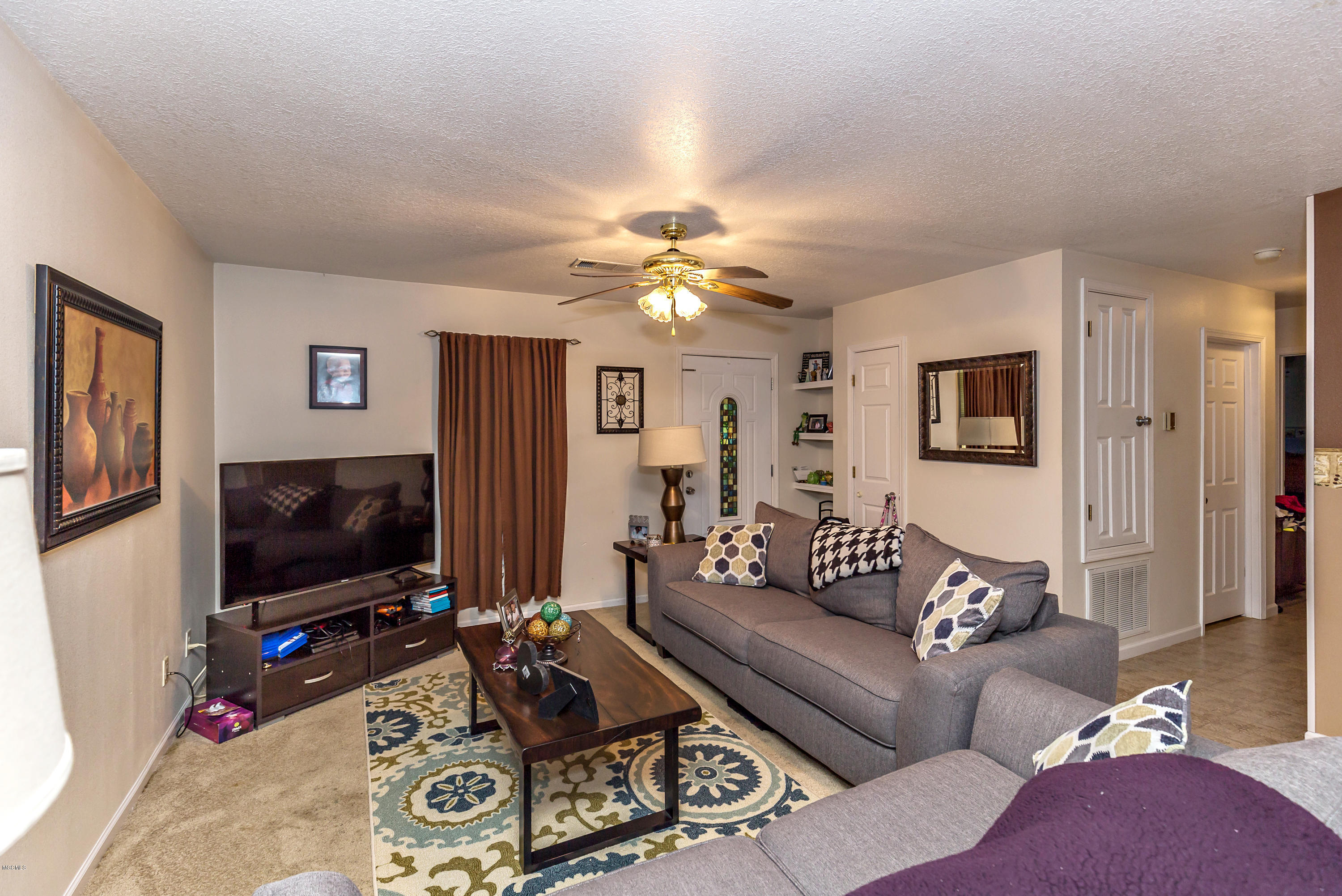 8021 Pointe Aux Chenes Road Ocean Springs, MS 39564 - Photo 4 of 33 livingroom
