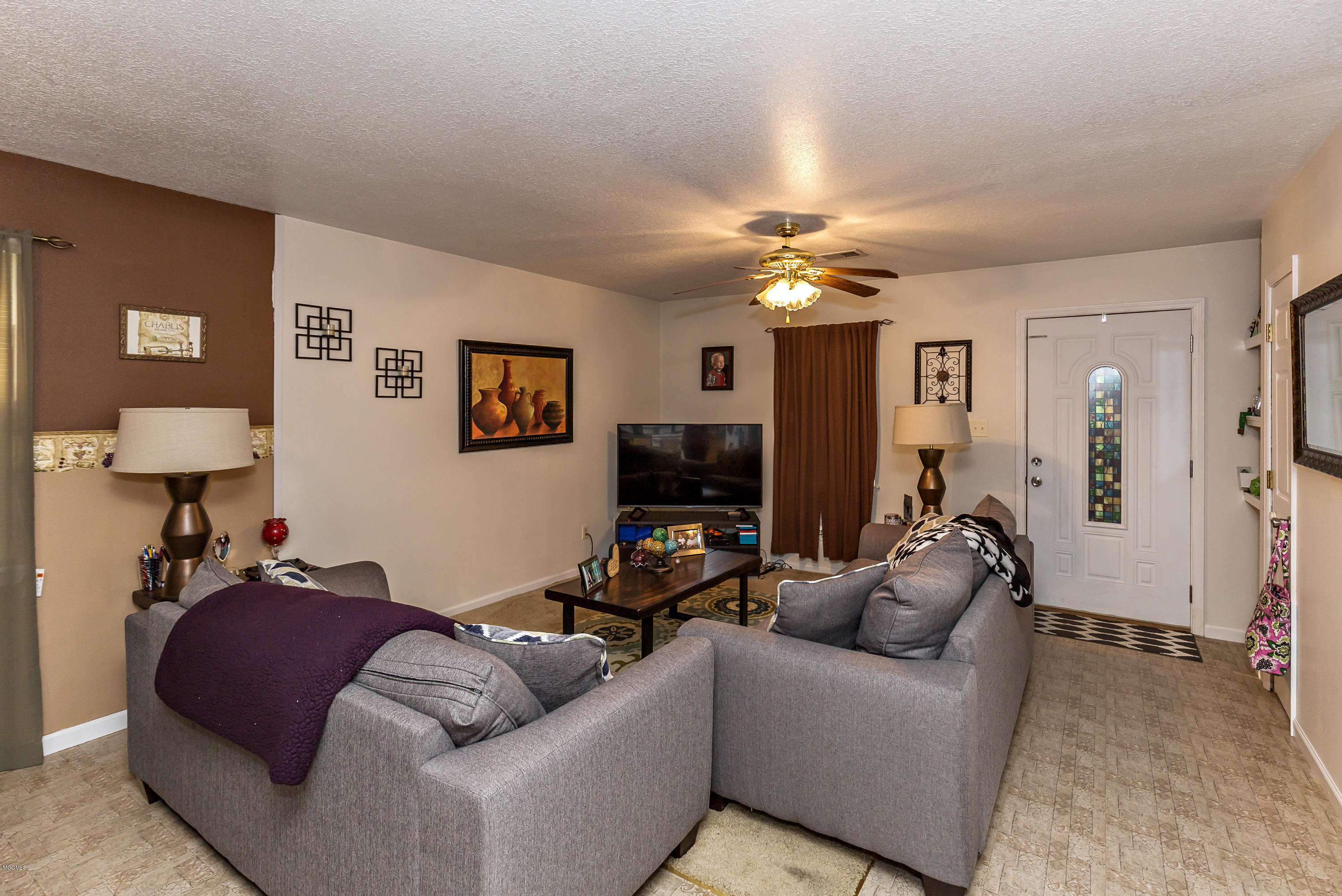 8021 Pointe Aux Chenes Road Ocean Springs, MS 39564 - Photo 5 of 33 living room