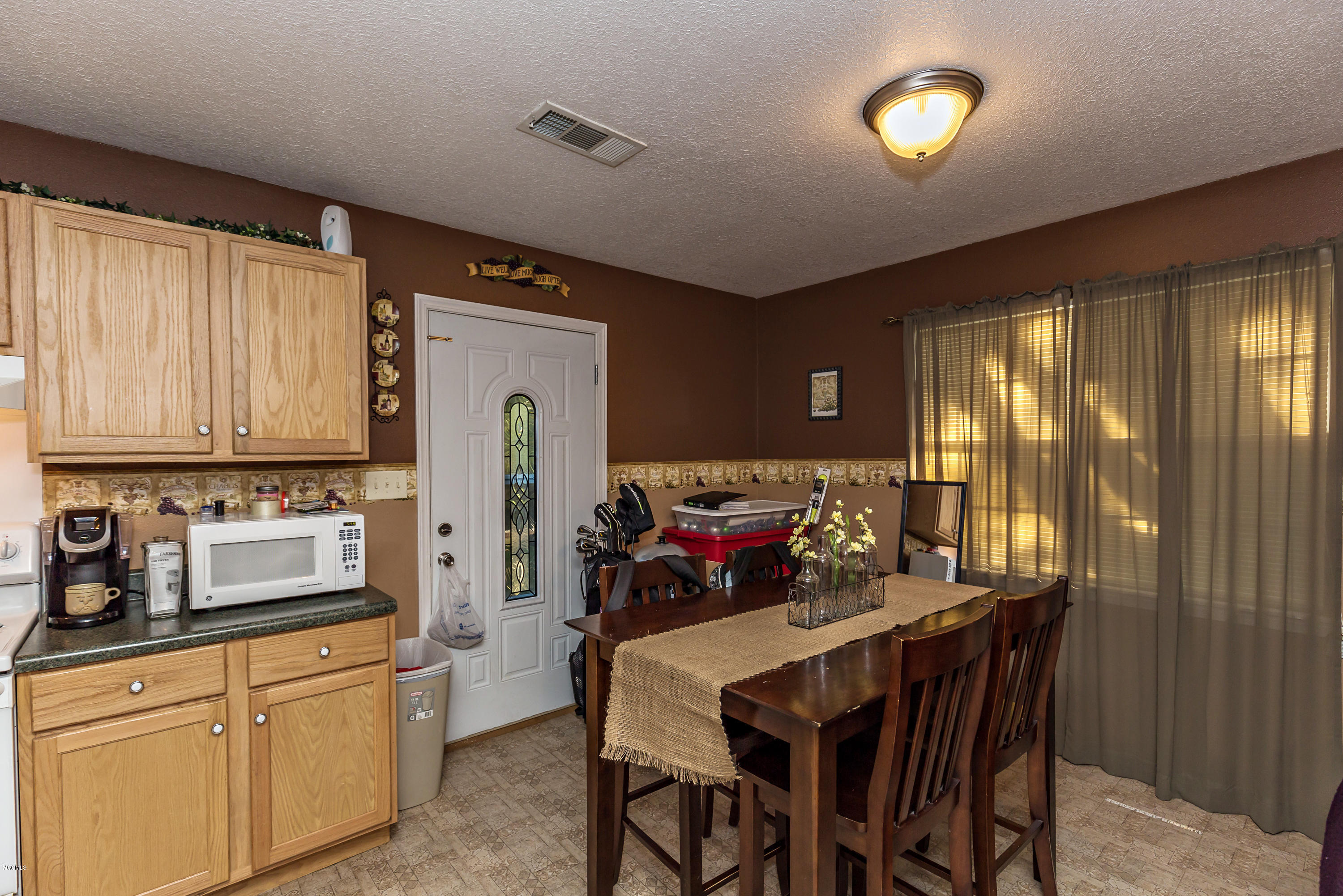 8021 Pointe Aux Chenes Road Ocean Springs, MS 39564 - Photo 8 of 33 dining rm
