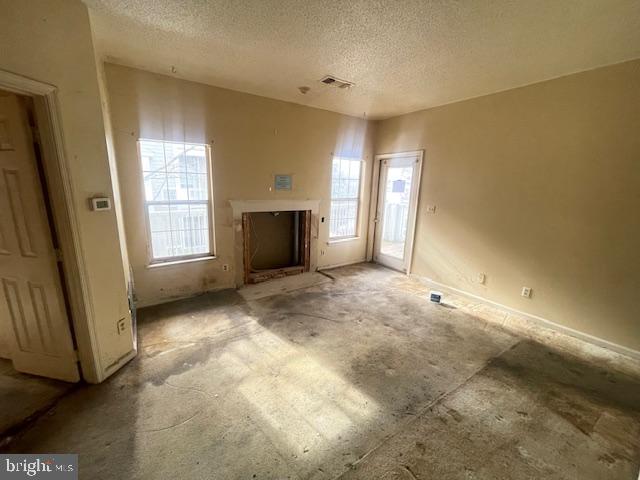 1716 Lake Shore Crest Drive, Unit 22 Reston, VA 20190 - Photo 13 of 28 a view of an empty room with a fireplace and a window