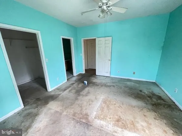 a view of a room with an empty space