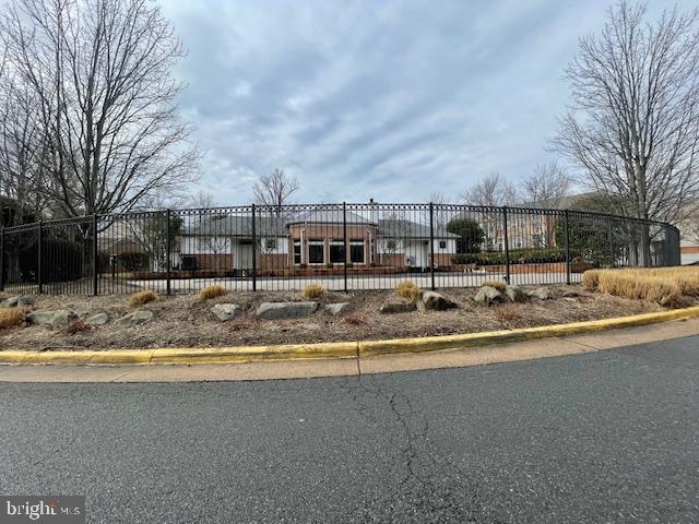 1716 Lake Shore Crest Drive, Unit 22 Reston, VA 20190 - Photo 26 of 28 a view of swimming pool with outdoor seating