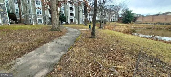 a view of a yard with a house