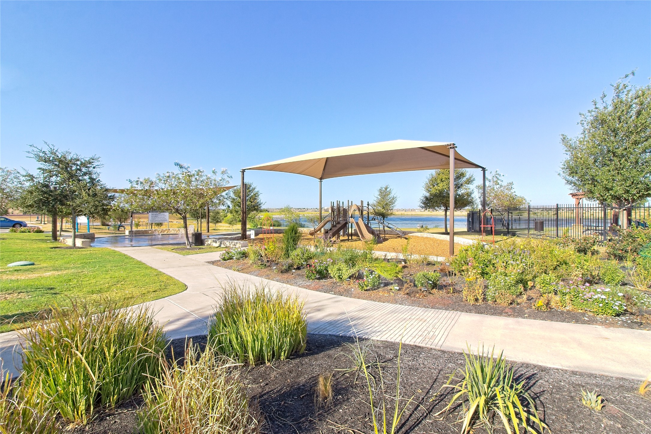 3618 Penelope Way Round Rock, TX 78665 - Photo 31 of 36 a view of a swimming pool with a patio and a yard