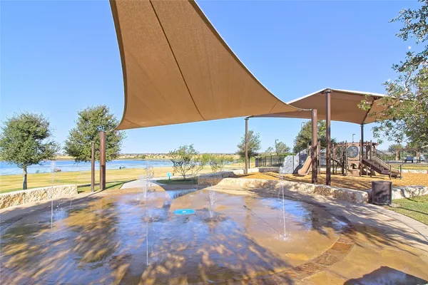 a view of a swimming pool with a lounge chairs