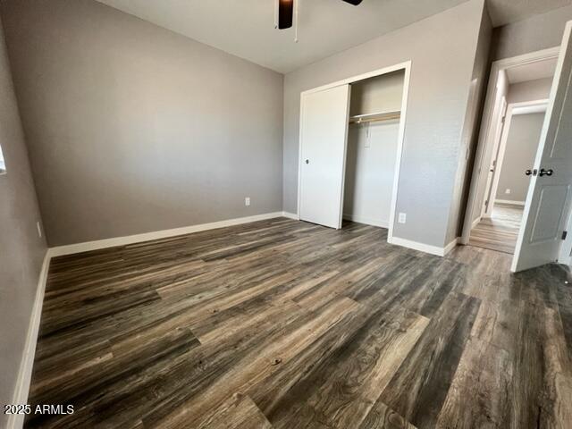 4552 North Loring Road Casa Grande, AZ 85194 - Photo 16 of 48 a view of an empty room with wooden floor