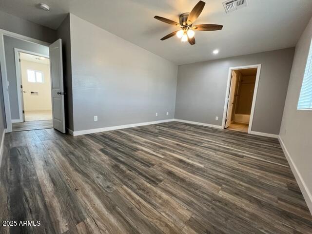 4552 North Loring Road Casa Grande, AZ 85194 - Photo 23 of 48 wooden floor in an empty room with a window