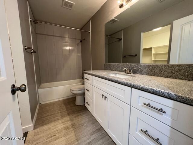 4552 North Loring Road Casa Grande, AZ 85194 - Photo 24 of 48 a bathroom with a granite countertop sink toilet and shower