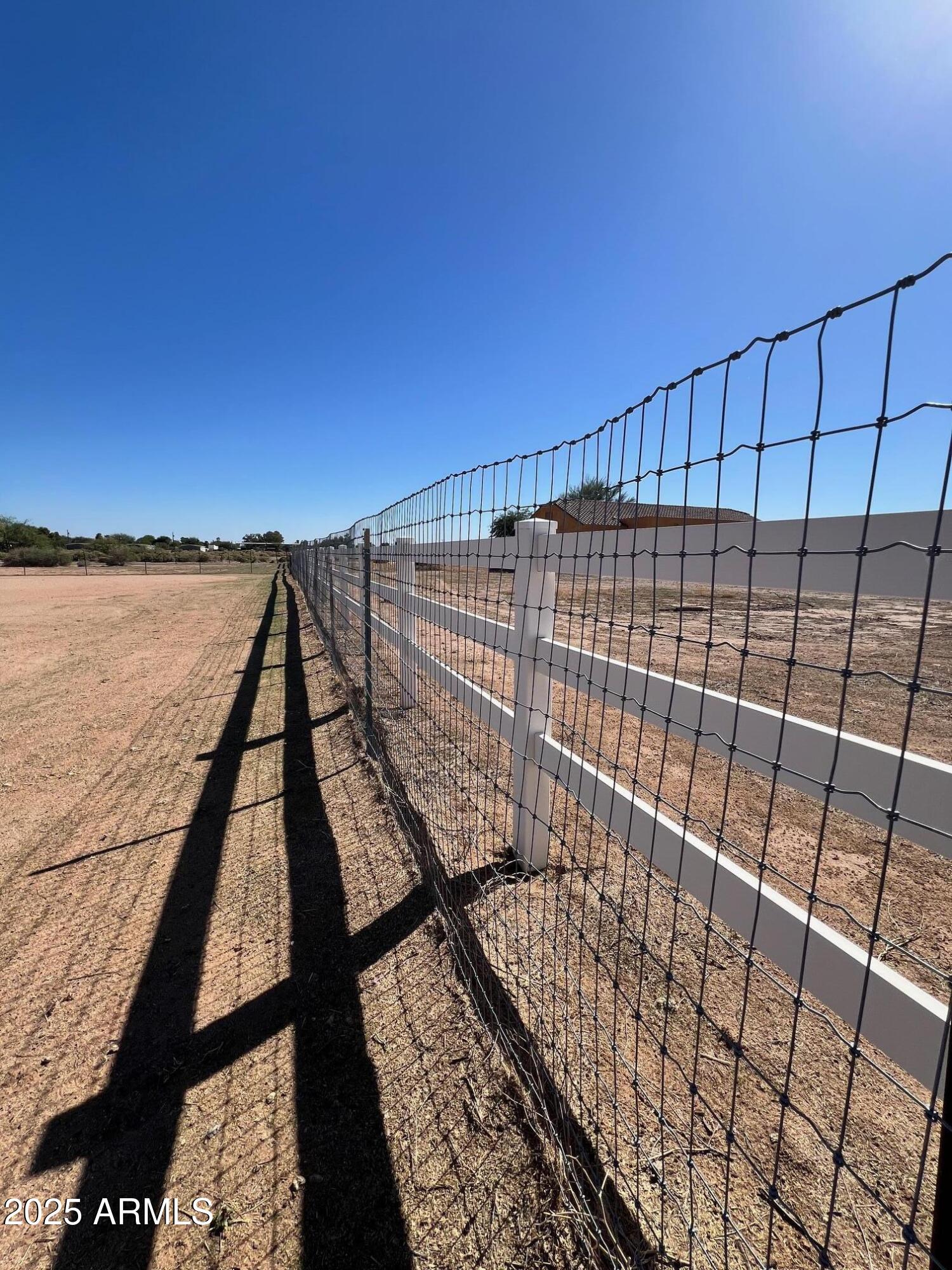 4552 North Loring Road Casa Grande, AZ 85194 - Photo 34 of 48 a view of balcony with wooden floor and fence