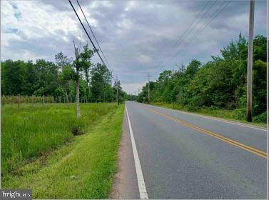 0 Accokeek Road Waldorf, MD 20601 - Photo 2 of 8 a view of a field with a big yard and palm trees