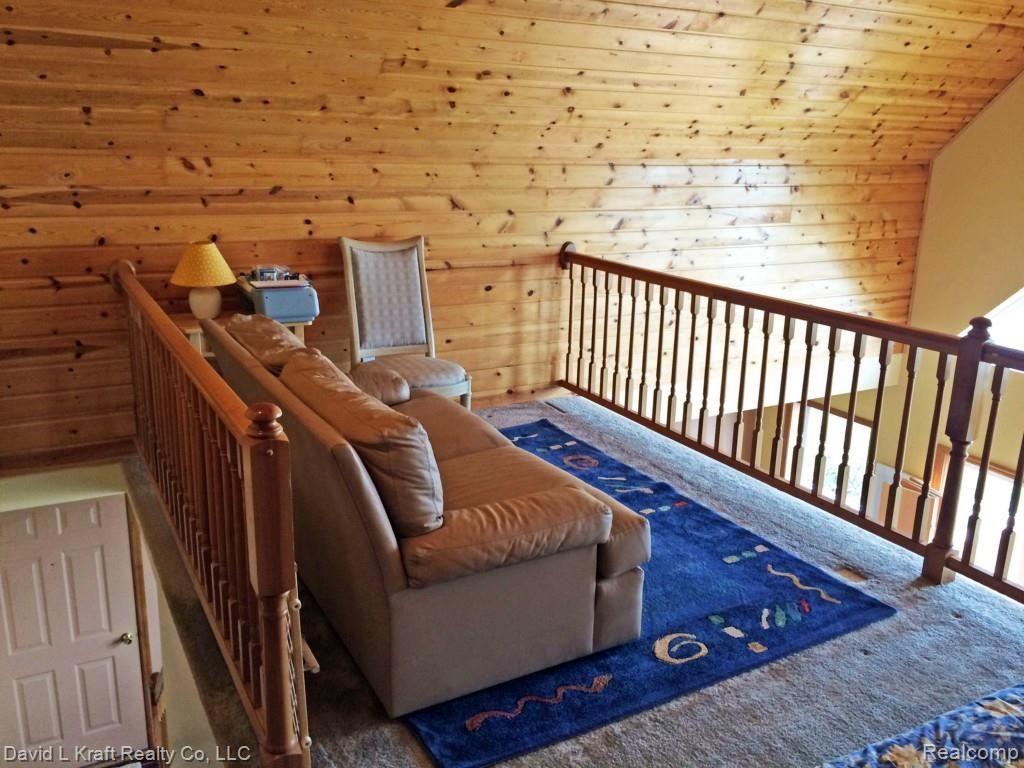 8564 Crescent Beach Road Pigeon, MI 48755 - Photo 15 of 28 8564CrescentBeachLoftCouch.jpg