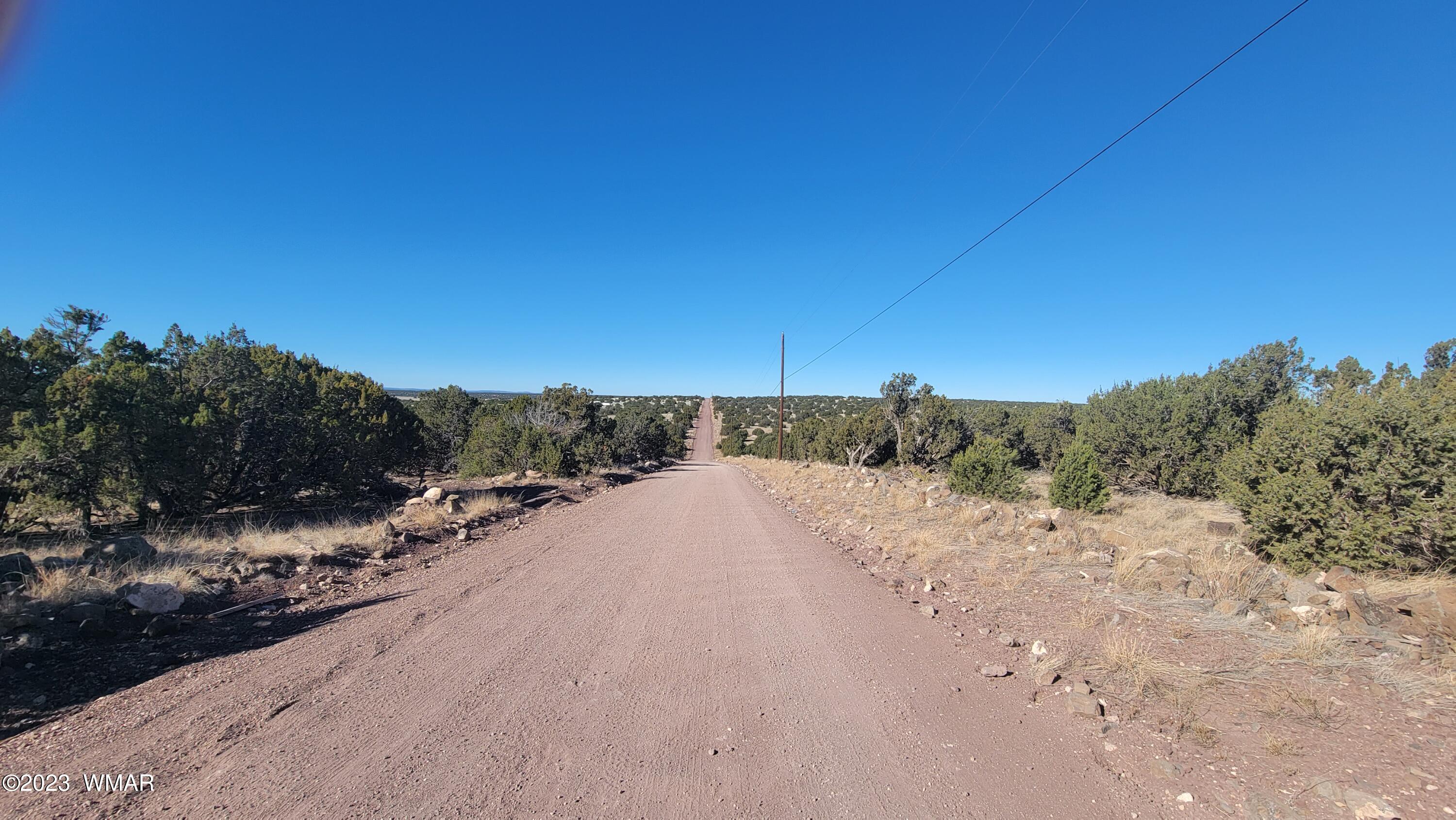 85 County Road 8249 Concho, AZ 85924 - Photo 1 of 11 a view of a road with a snow in the background