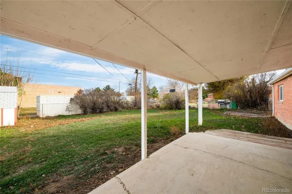 a view of a backyard with garden
