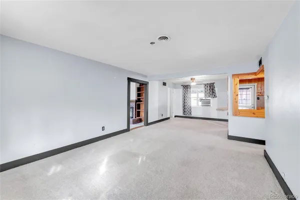 a view of an empty room with window