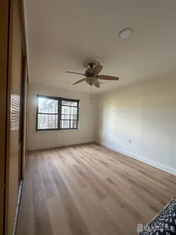 a view of a livingroom with a flat screen tv