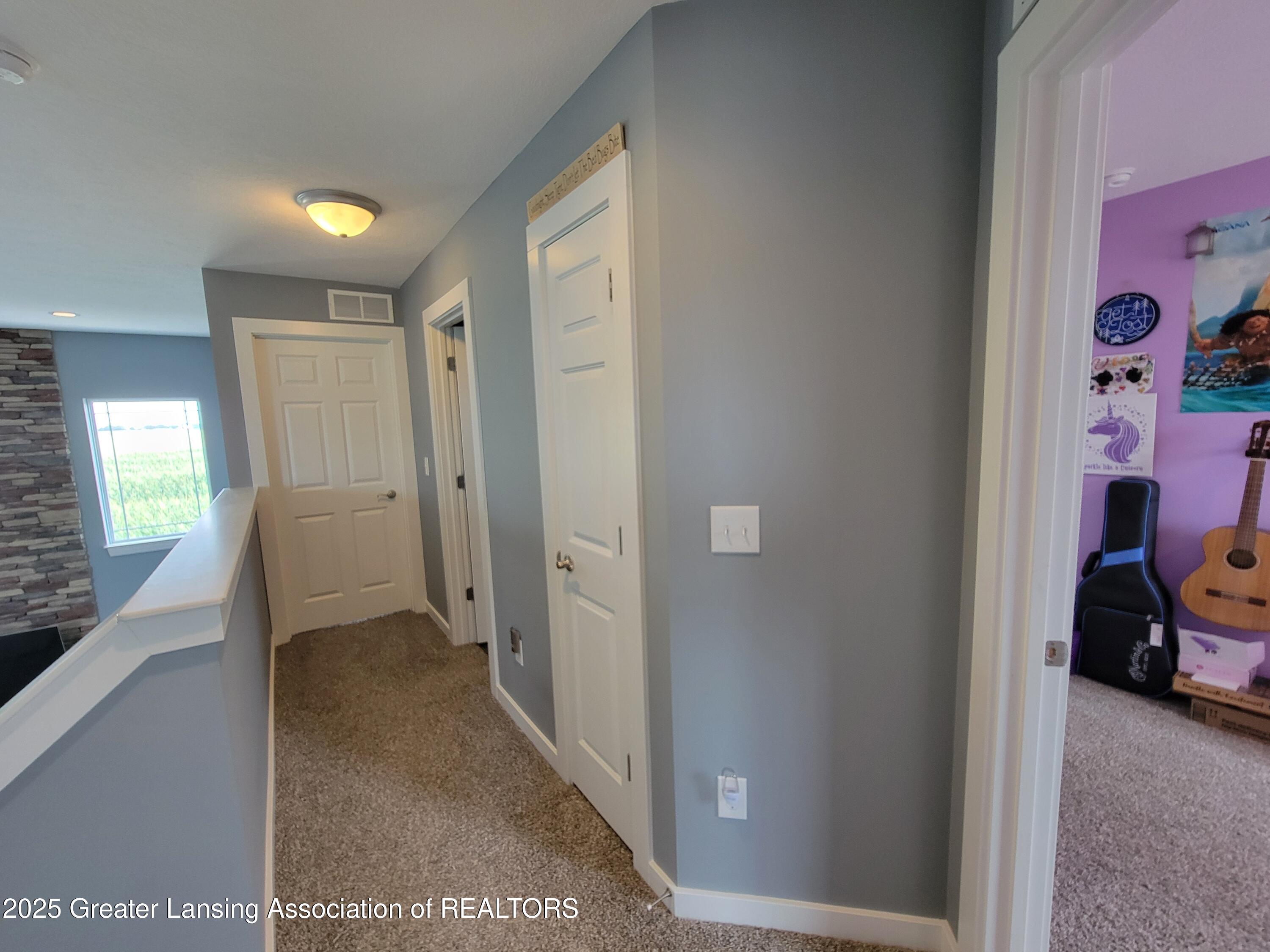 195 Jade Court Alma, MI 48801 - Photo 35 of 53 Upstairs hallway