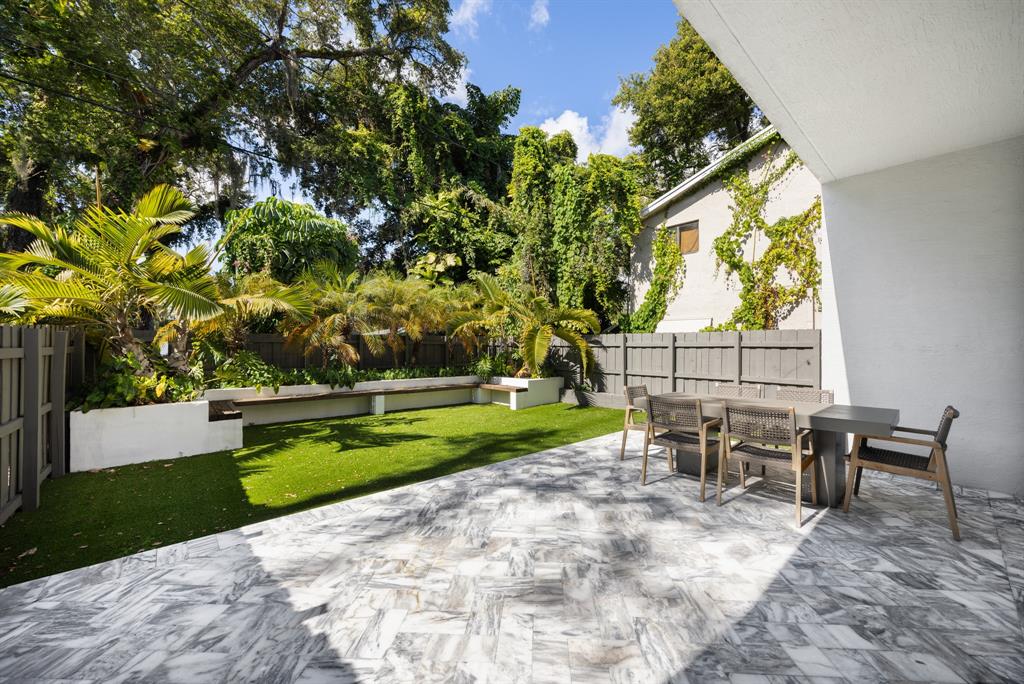 834 Southwest 16th Street Fort Lauderdale, FL 33315 - Photo 26 of 26 a view of a house with backyard sitting area and garden