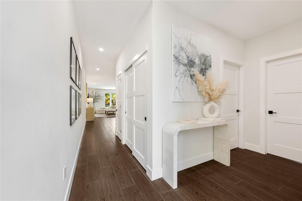 834 Southwest 16th Street Fort Lauderdale, FL 33315 - Photo 4 of 26 a view of a hallway with wooden floor and staircase