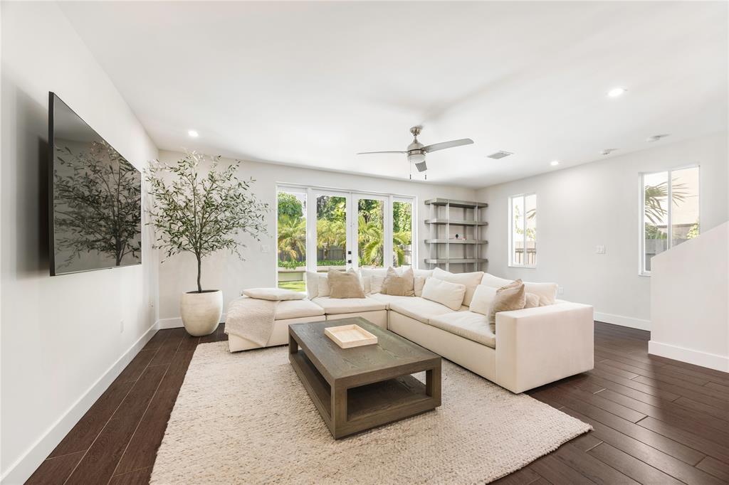 834 Southwest 16th Street Fort Lauderdale, FL 33315 - Photo 7 of 26 a living room with furniture and a large window