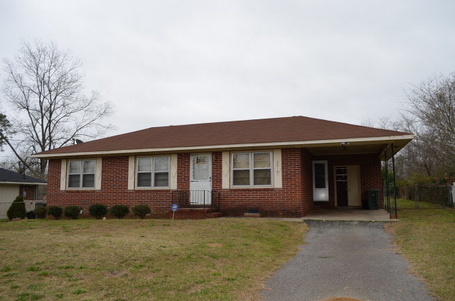 3814 Lindsey Drive, Unit 13 Macon, GA 31206 - Photo 1 of 1 a view of a house with a yard