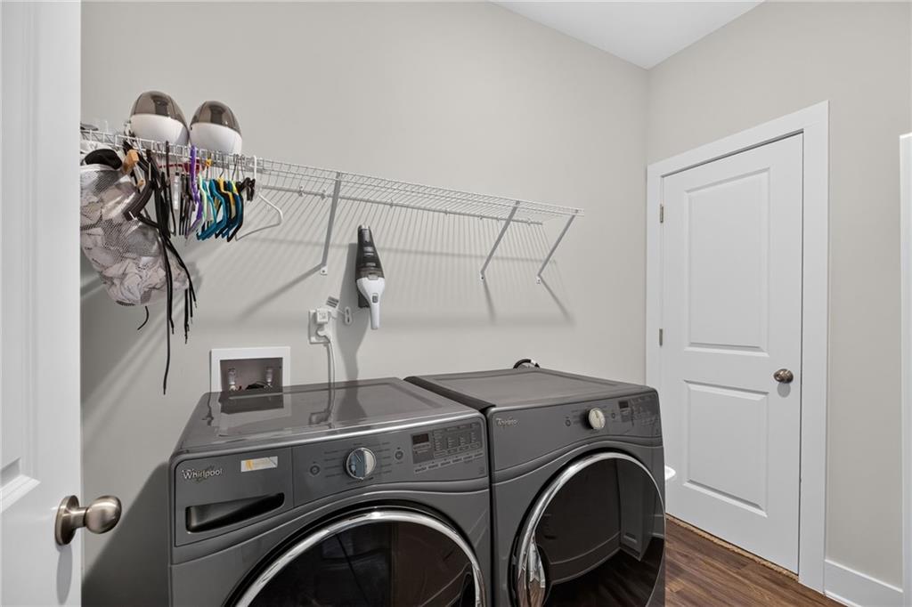 139 Manchester Lane Villa Rica, GA 30180 - Photo 28 of 60 a view of livingroom with washer and dryer