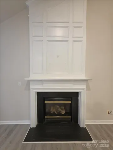 a living room with a fireplace