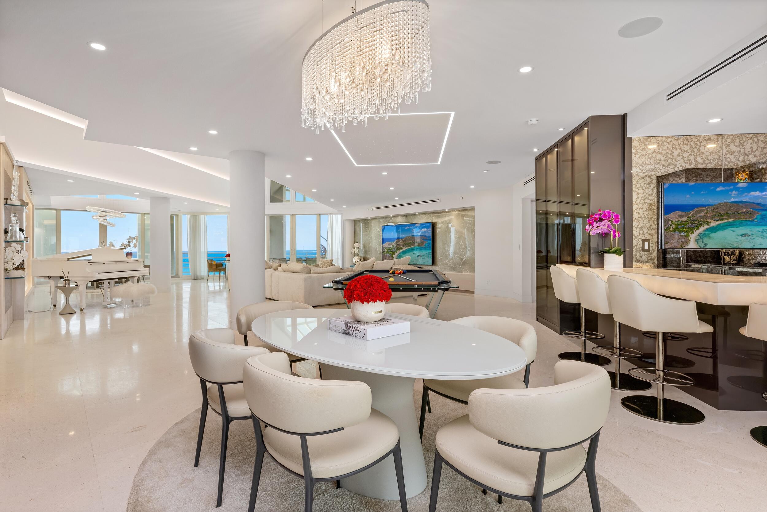 800 South Ocean Boulevard, Unit PH6 Boca Raton, FL 33432 - Photo 13 of 69 a view of a dining room with furniture and wooden floor