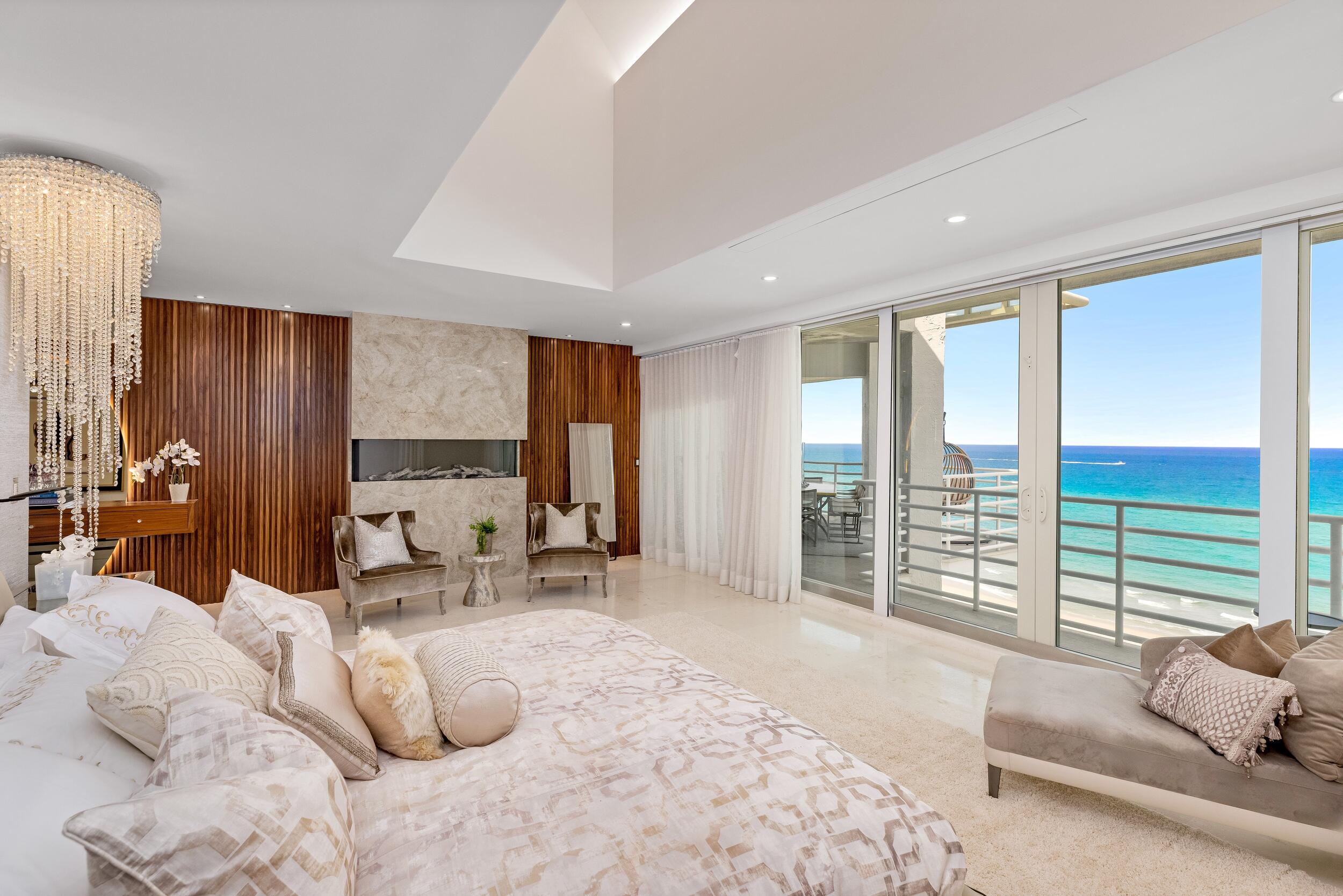 800 South Ocean Boulevard, Unit PH6 Boca Raton, FL 33432 - Photo 33 of 69 a bedroom with furniture and large windows