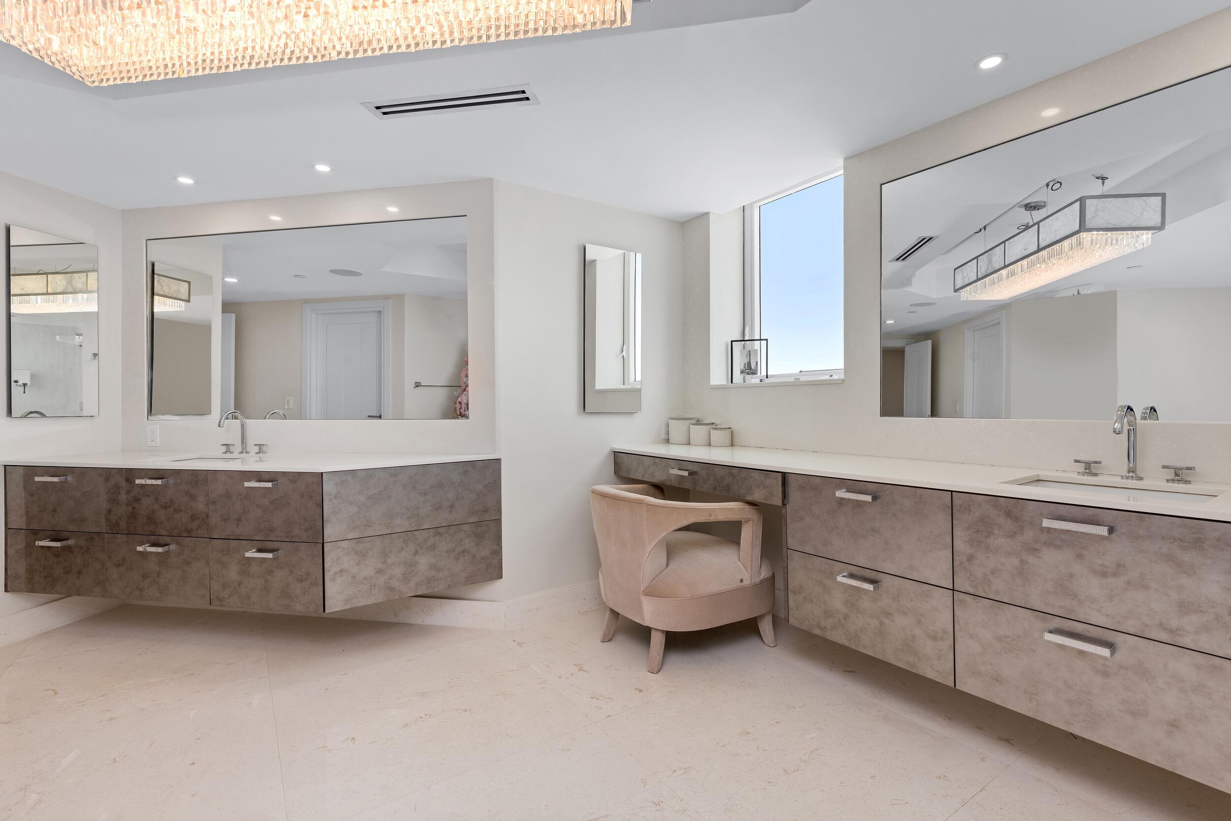 800 South Ocean Boulevard, Unit PH6 Boca Raton, FL 33432 - Photo 41 of 69 a spacious bathroom with a double vanity sink double and mirror