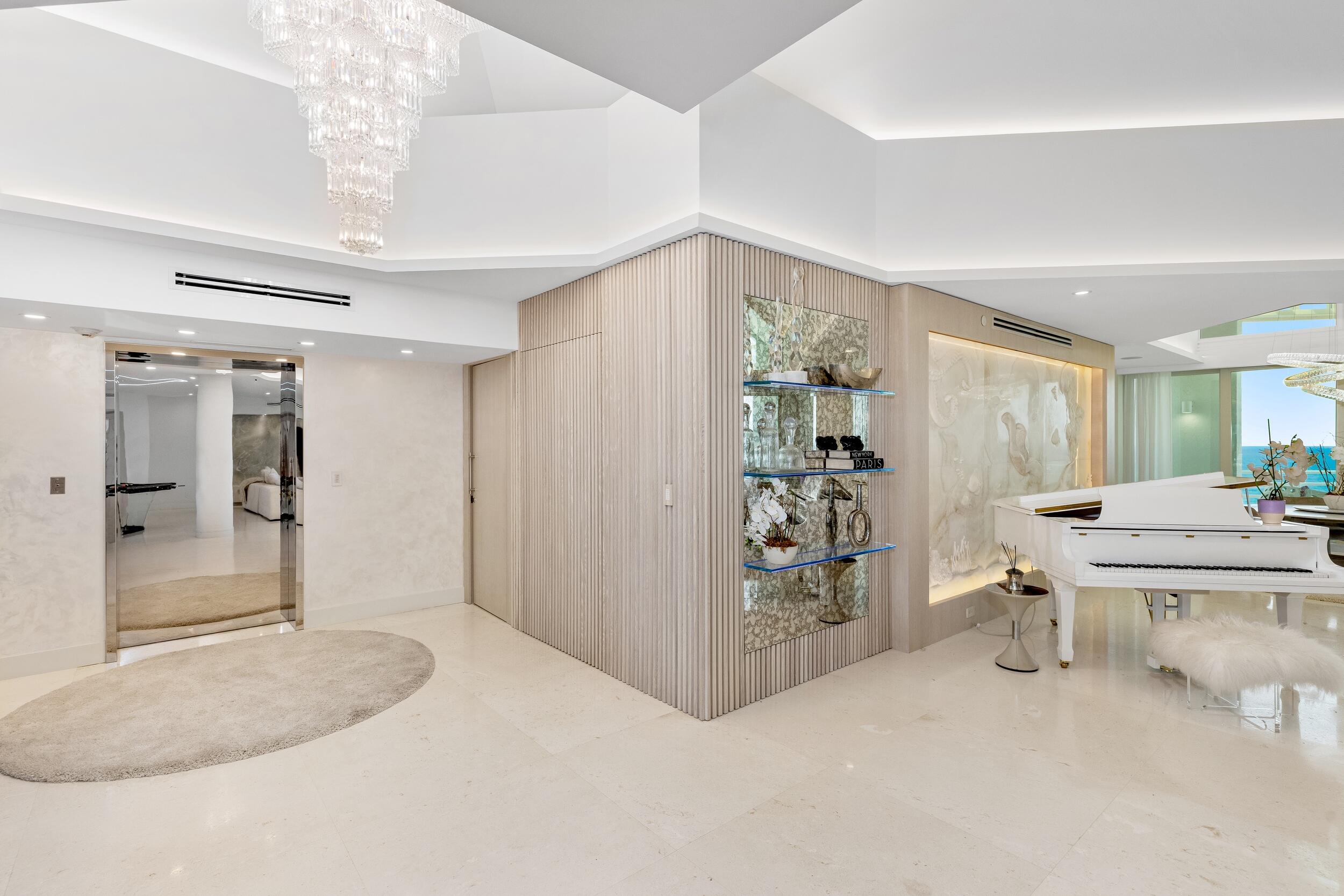 800 South Ocean Boulevard, Unit PH6 Boca Raton, FL 33432 - Photo 56 of 69 a bathroom with a sink a toilet and shower