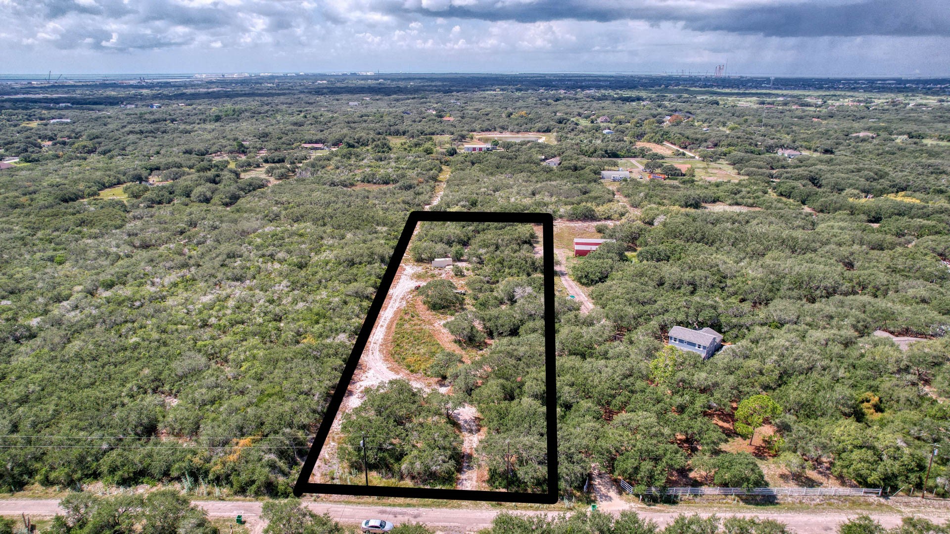 0 West Rhodes Avenue Aransas Pass, TX 78336 - Photo 13 of 25 an aerial view of house with yard