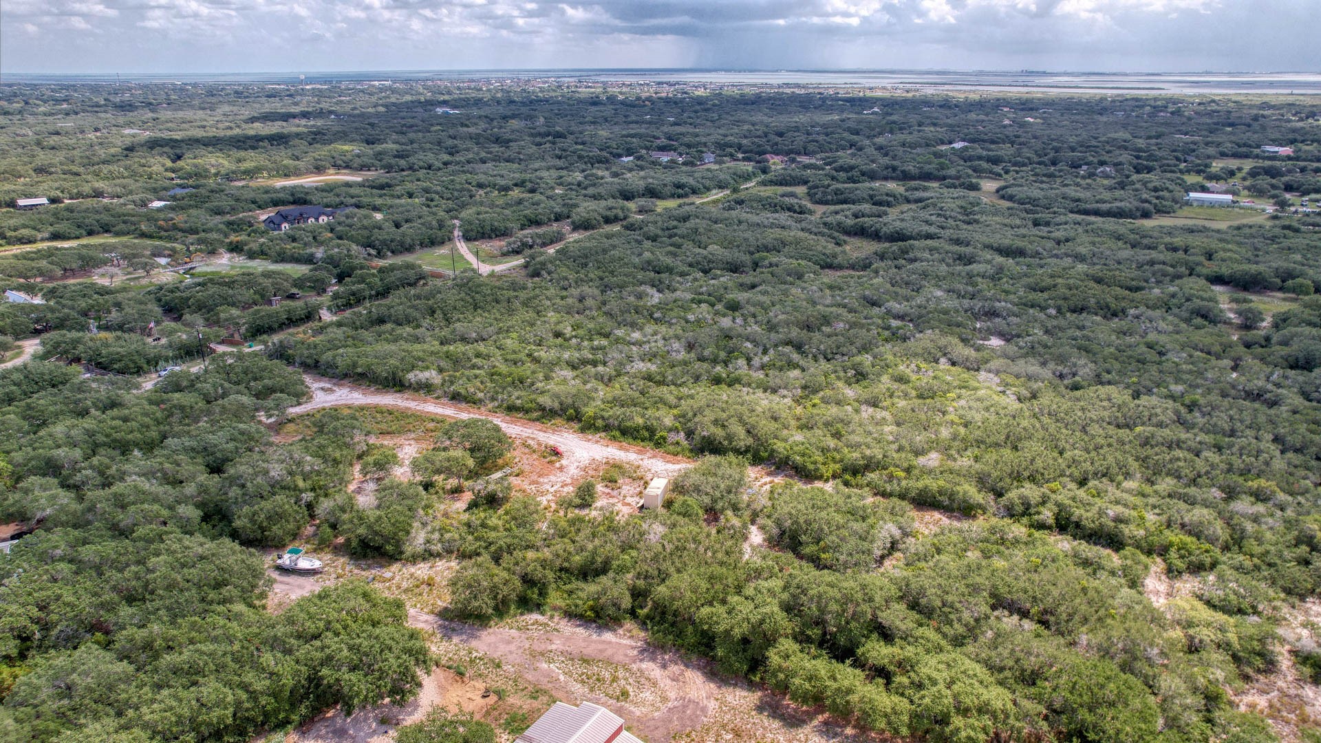 0 West Rhodes Avenue Aransas Pass, TX 78336 - Photo 14 of 25 an aerial view of residential house and green space