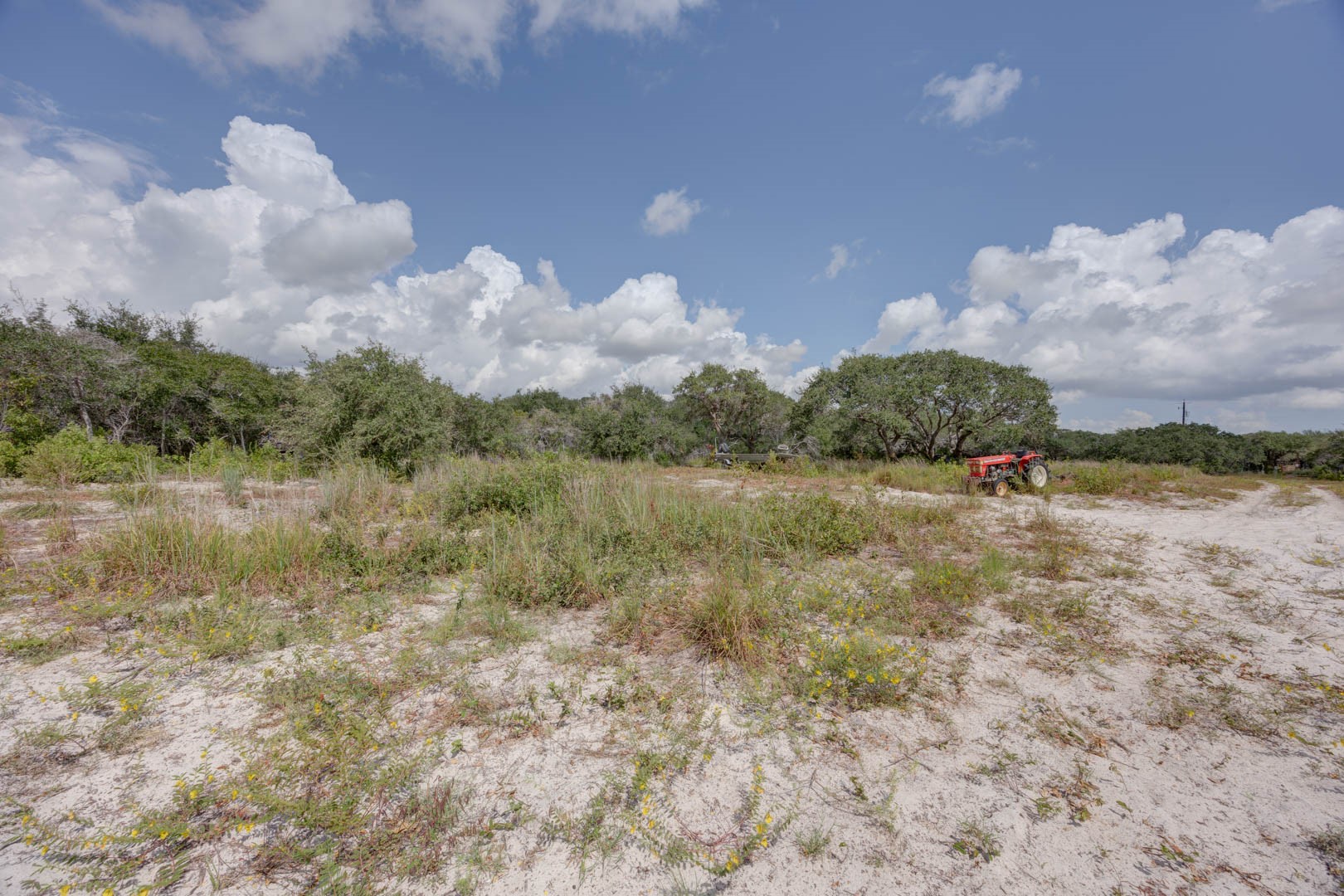 0 West Rhodes Avenue Aransas Pass, TX 78336 - Photo 19 of 25 a view of a lake with houses in the background