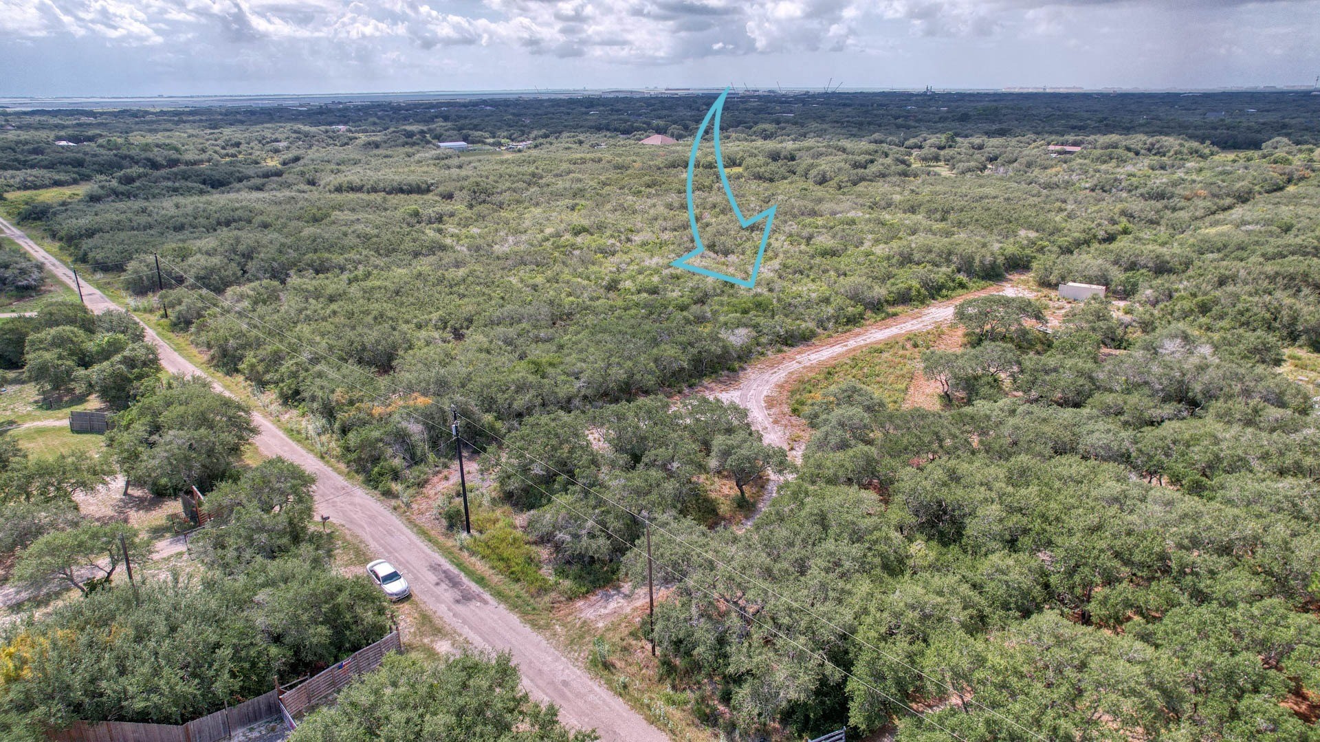0 West Rhodes Avenue Aransas Pass, TX 78336 - Photo 2 of 25 a view of a yard next to a yard