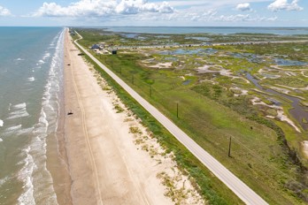 11735 Bluewater Highway Freeport, TX 77541 - Photo 6 of 6 a view of ocean from a balcony