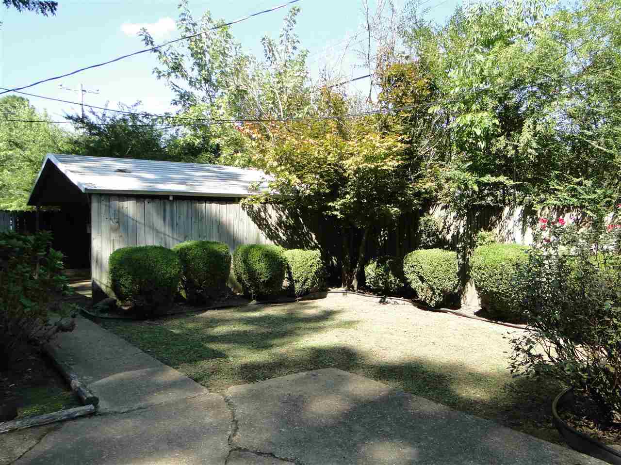 5000 Sea Isle Road Memphis, TN 38117 - Photo 12 of 14 a view of a house with a yard