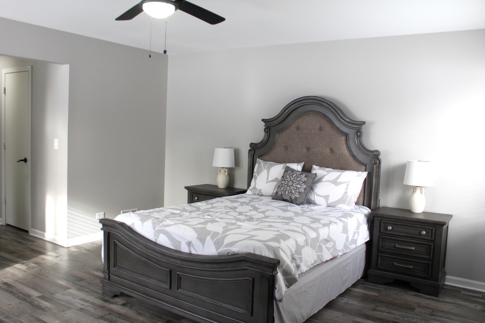 908 Glenmore Lane Elgin, IL 60124 - Photo 13 of 50 a bedroom with a bed and wooden floor