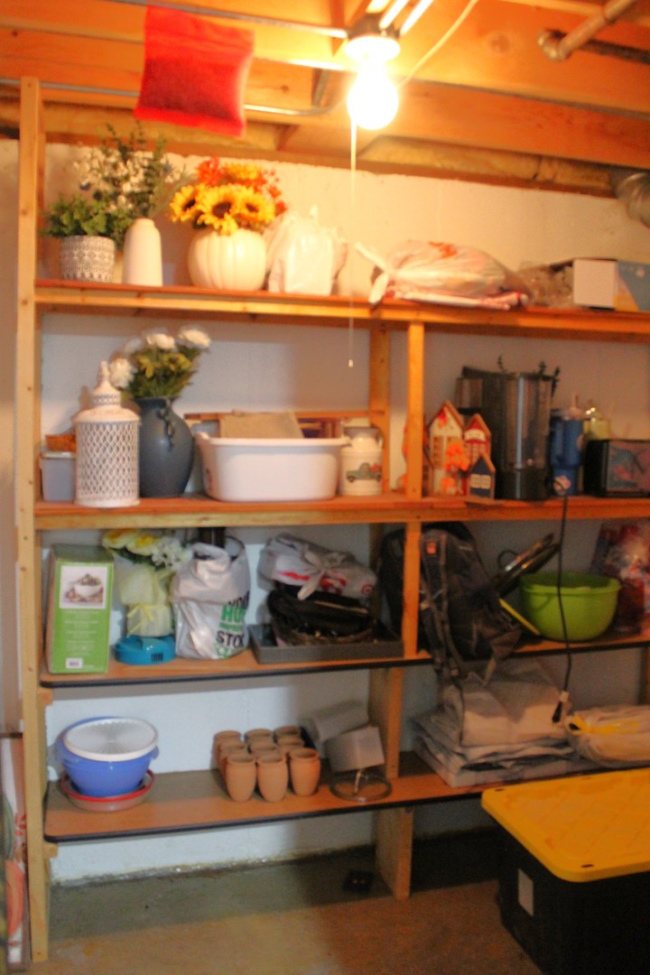 908 Glenmore Lane Elgin, IL 60124 - Photo 42 of 50 a view of a balcony with book shelf