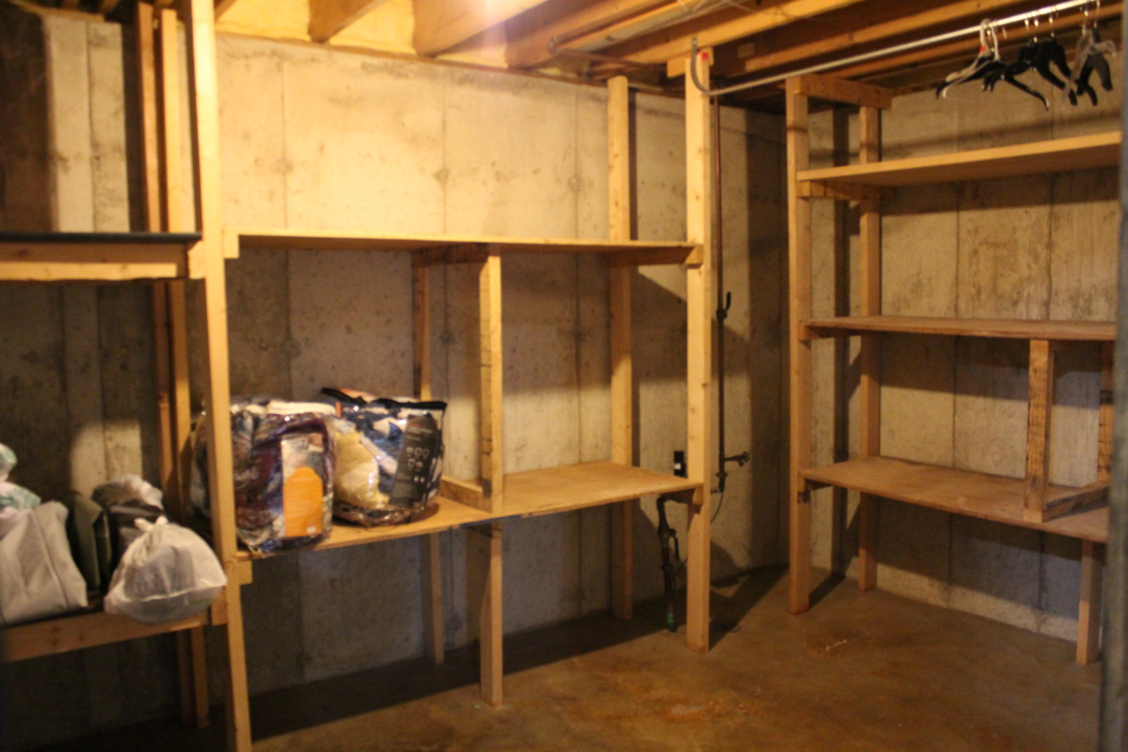 908 Glenmore Lane Elgin, IL 60124 - Photo 43 of 50 a view of walk in closet with clothes and shoes