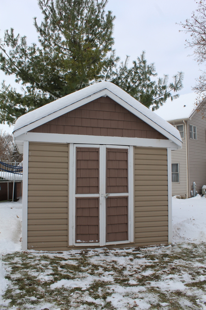 908 Glenmore Lane Elgin, IL 60124 - Photo 47 of 50 a front view of a house