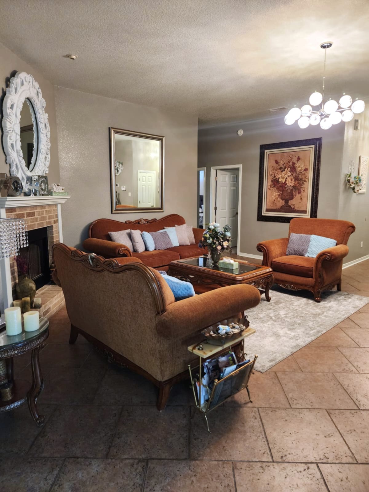 5603 Hunters Ridge Trail Killeen, TX 76542 - Photo 7 of 13 Ornate furnishings and a contemporary chandelier define this elegant living space.