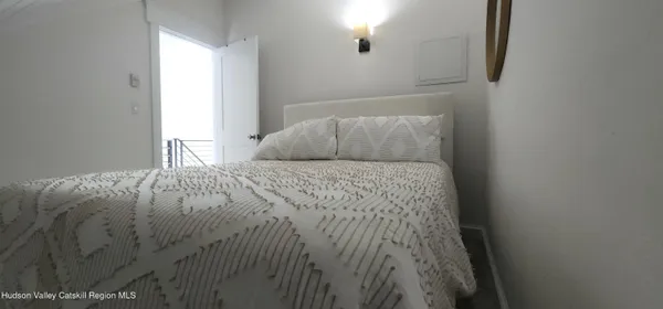 a bedroom with a bed
