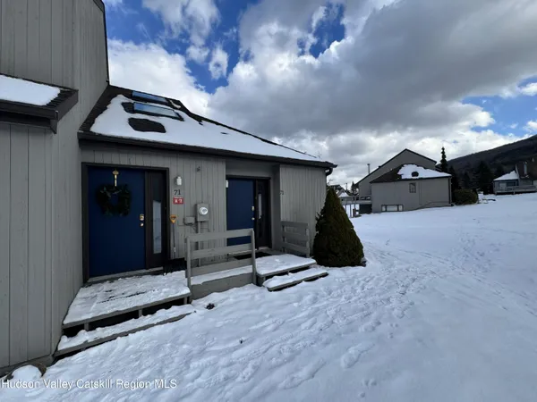 a view of a backyard of the house
