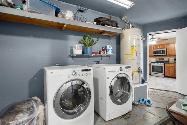 a utility room with dryer and washer