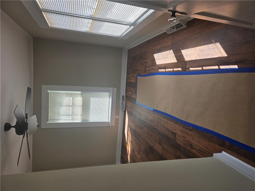 506 Taylor Street Anderson, SC 29625 - Photo 11 of 15 This interior space features laminate flooring and abundant natural light.