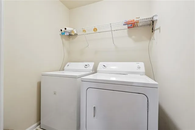 a utility room with dryer and washer