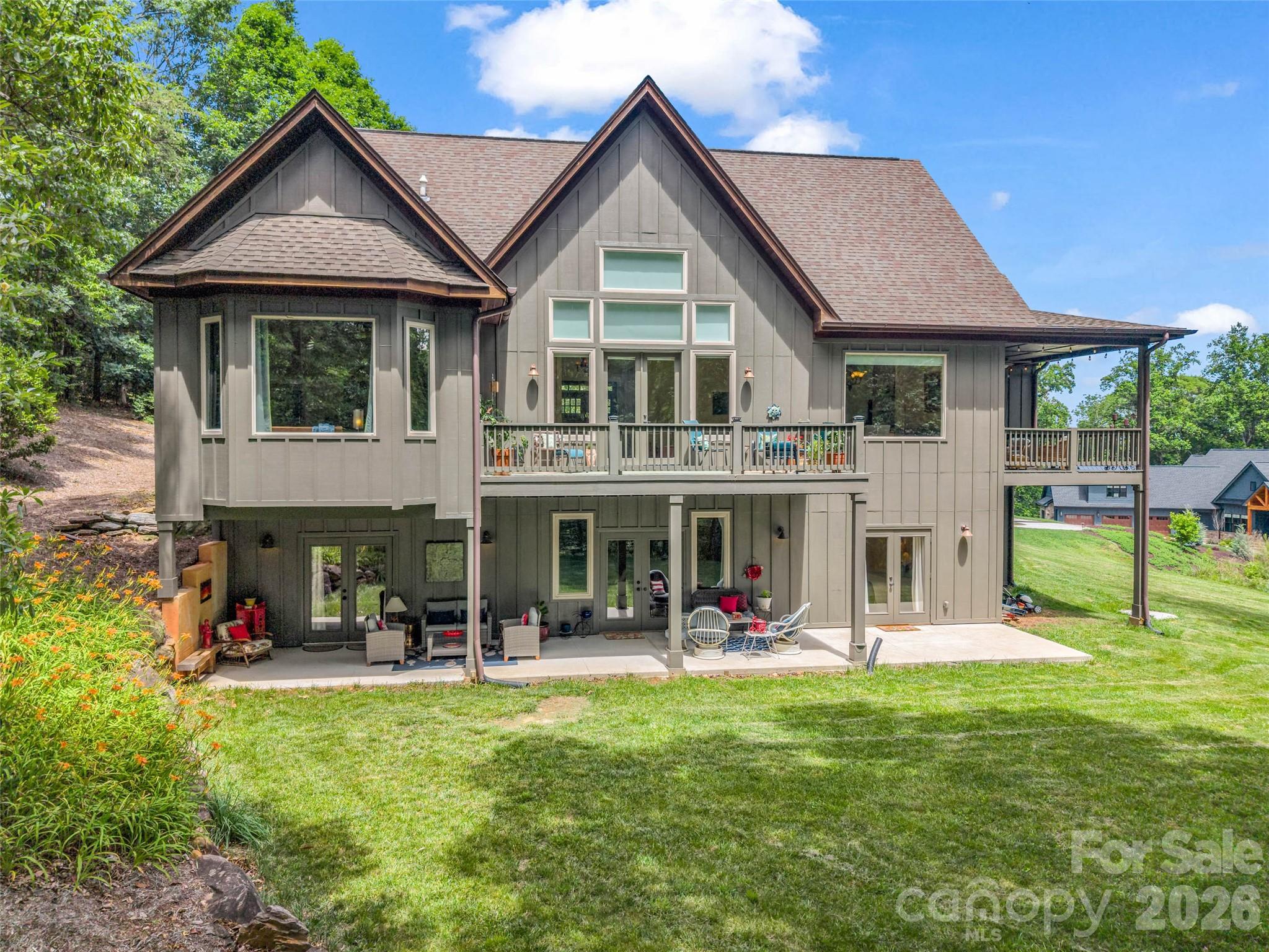 120 Glenn Court Mill Spring, NC 28756 - Photo 5 of 48 a front view of a house with porch
